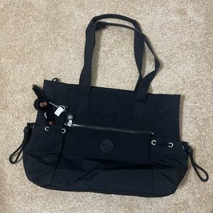 NWOT: kipling large shoulder bag.  Very roomy, lots of pockets